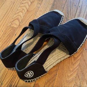 Tory Burch espadrille slides in black.